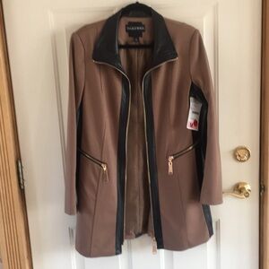 Beautiful light winter coat by Talk of The Walk.